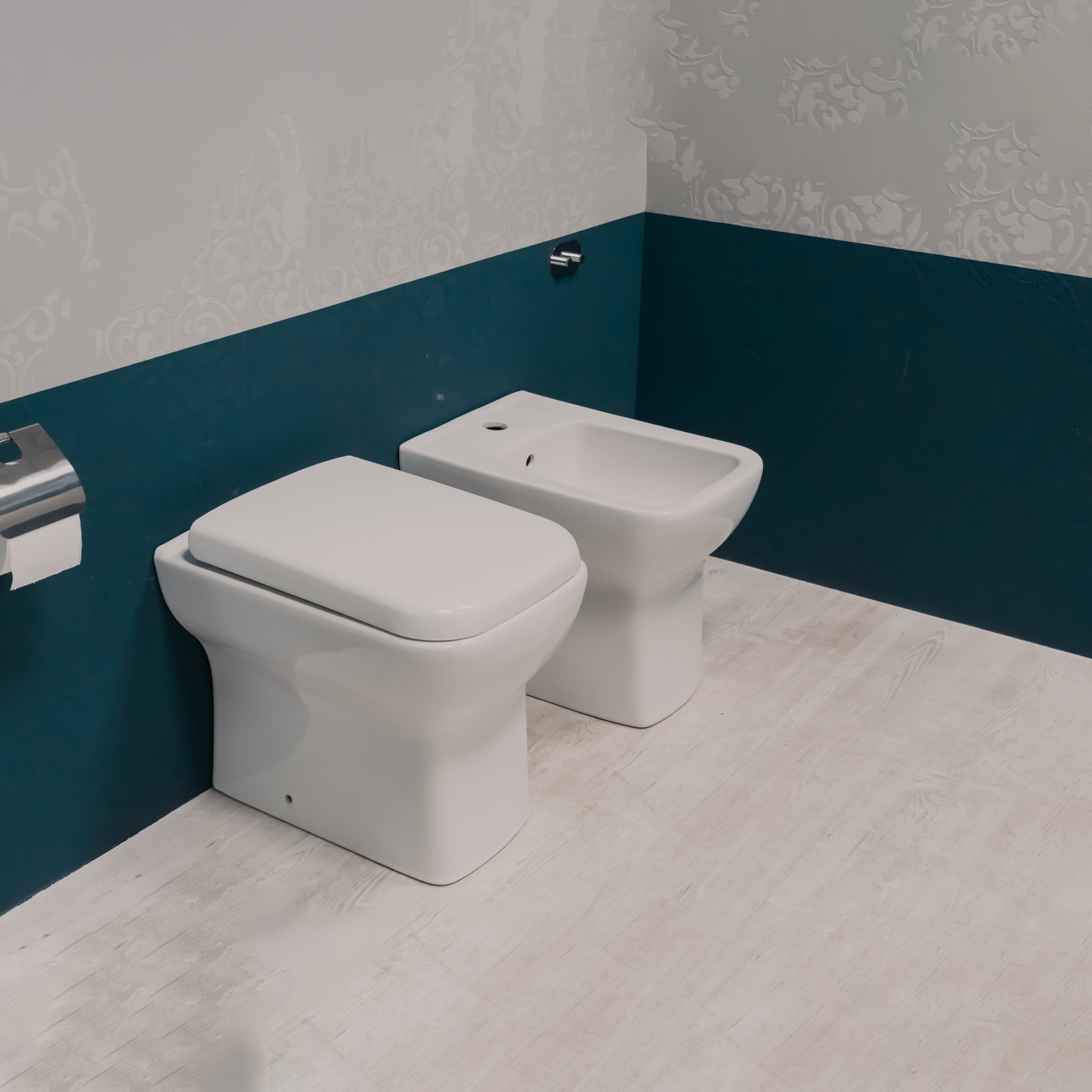 Coppia sanitari Piccolo filomuro (BTW): bidet + WC rimless con sedile soft close